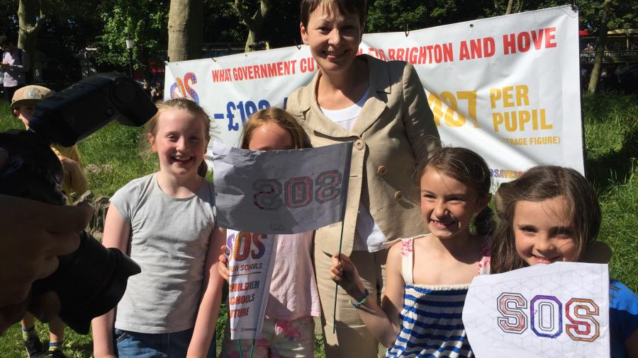 Caroline and children at the Save Our Schools rally